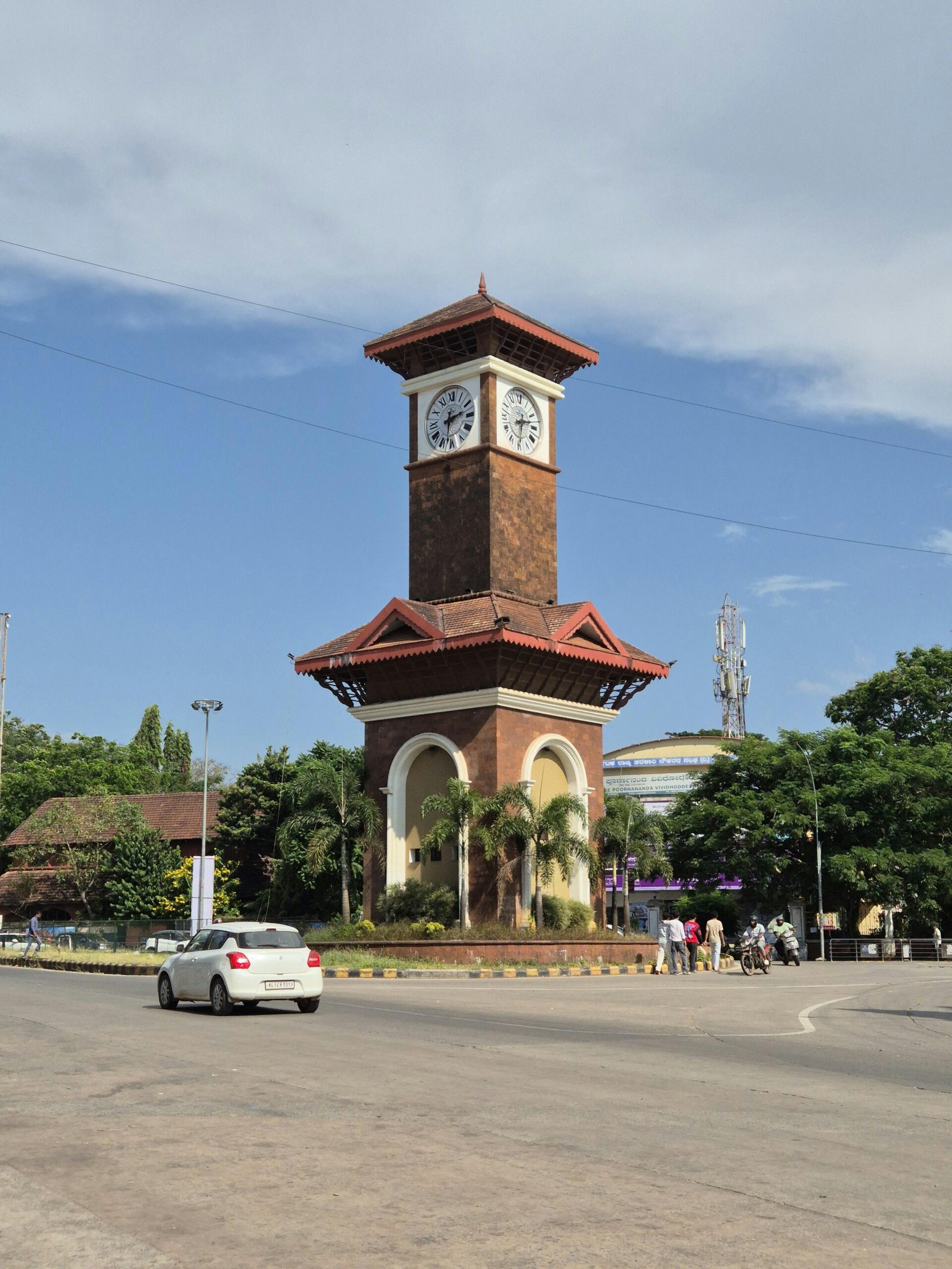 Scenic view of the iconic Mangaluru clock tower against a clear blue sky.